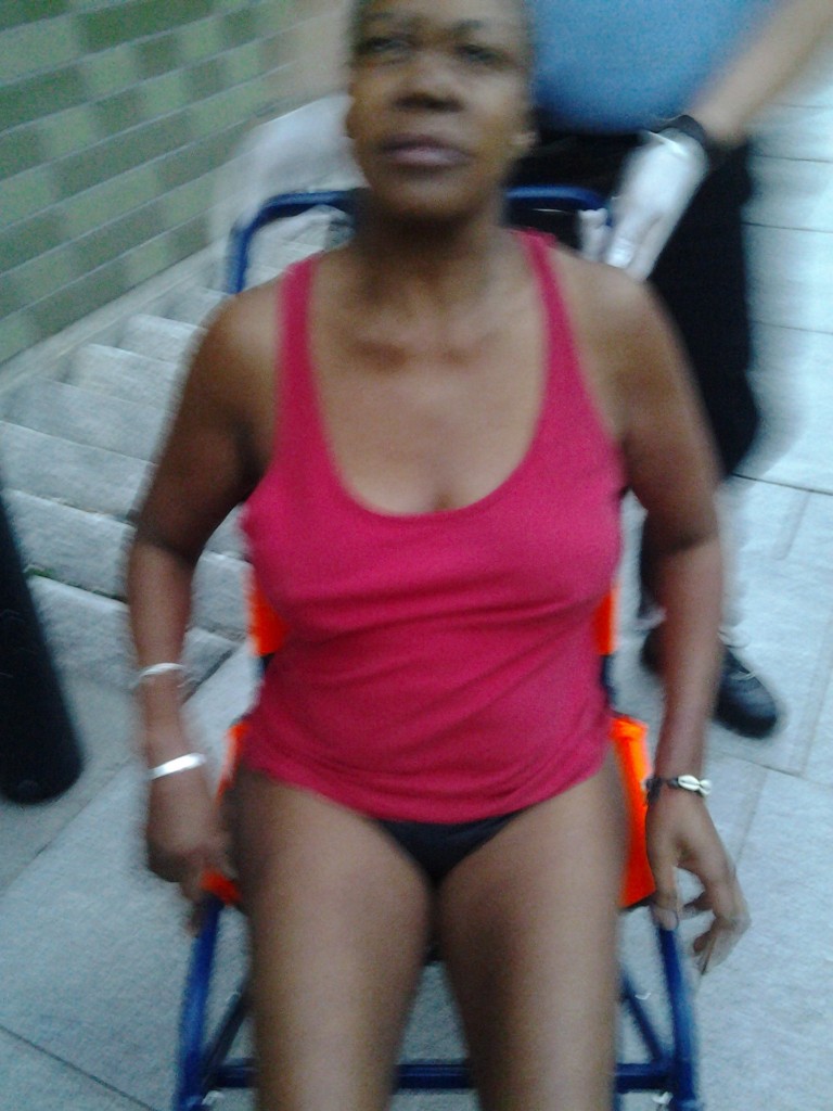 Mrs Enyam was wheeled out of custody wearing only underpants and a singlet.